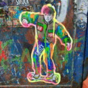 Man skating painted in grafitti
