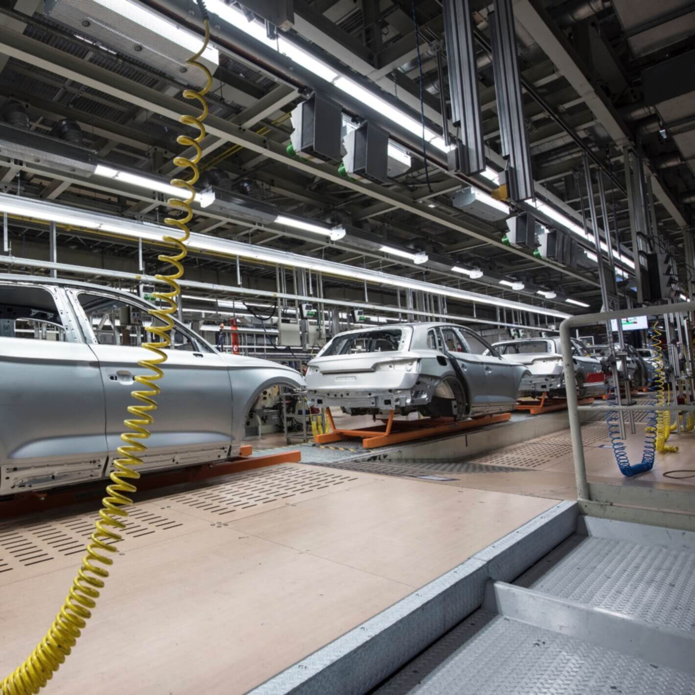 Cars in a factory being built