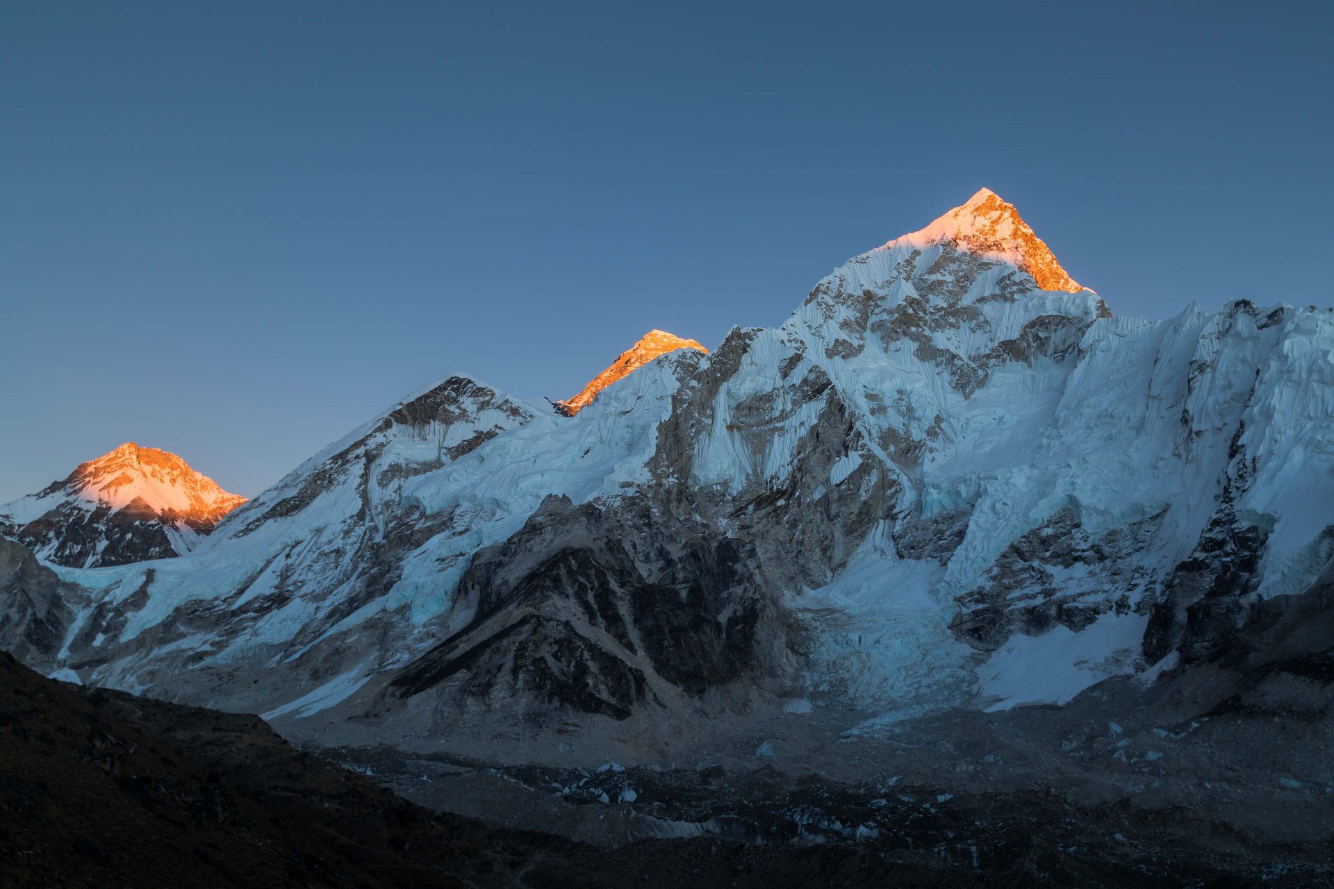 Image of mount everest with three peaks bathed in sunshine