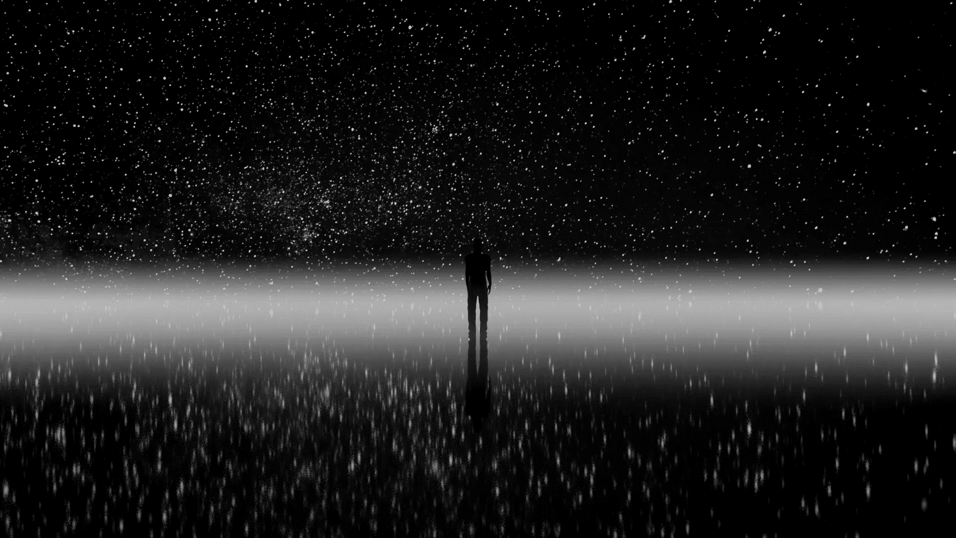Black and white photo of person with background looking like stars in the sky